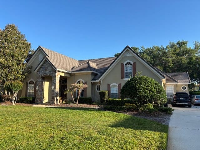 Completed concrete tile roof on a Central Florida home by Capital Premier Roofing Partners